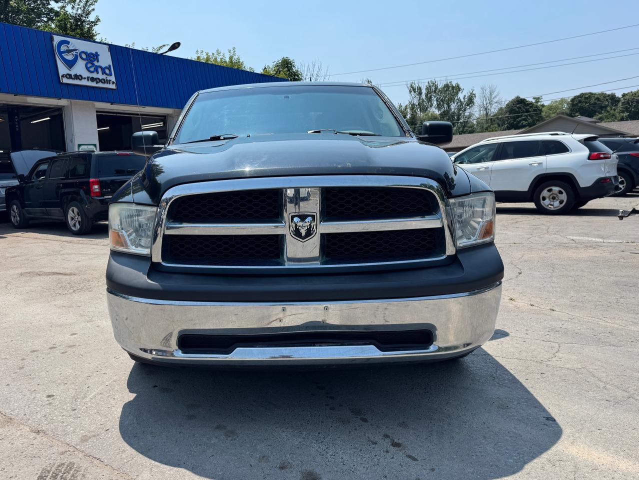 2011 RAM 1500 4WD QUAD CAB 140.5" ST - Photo #2