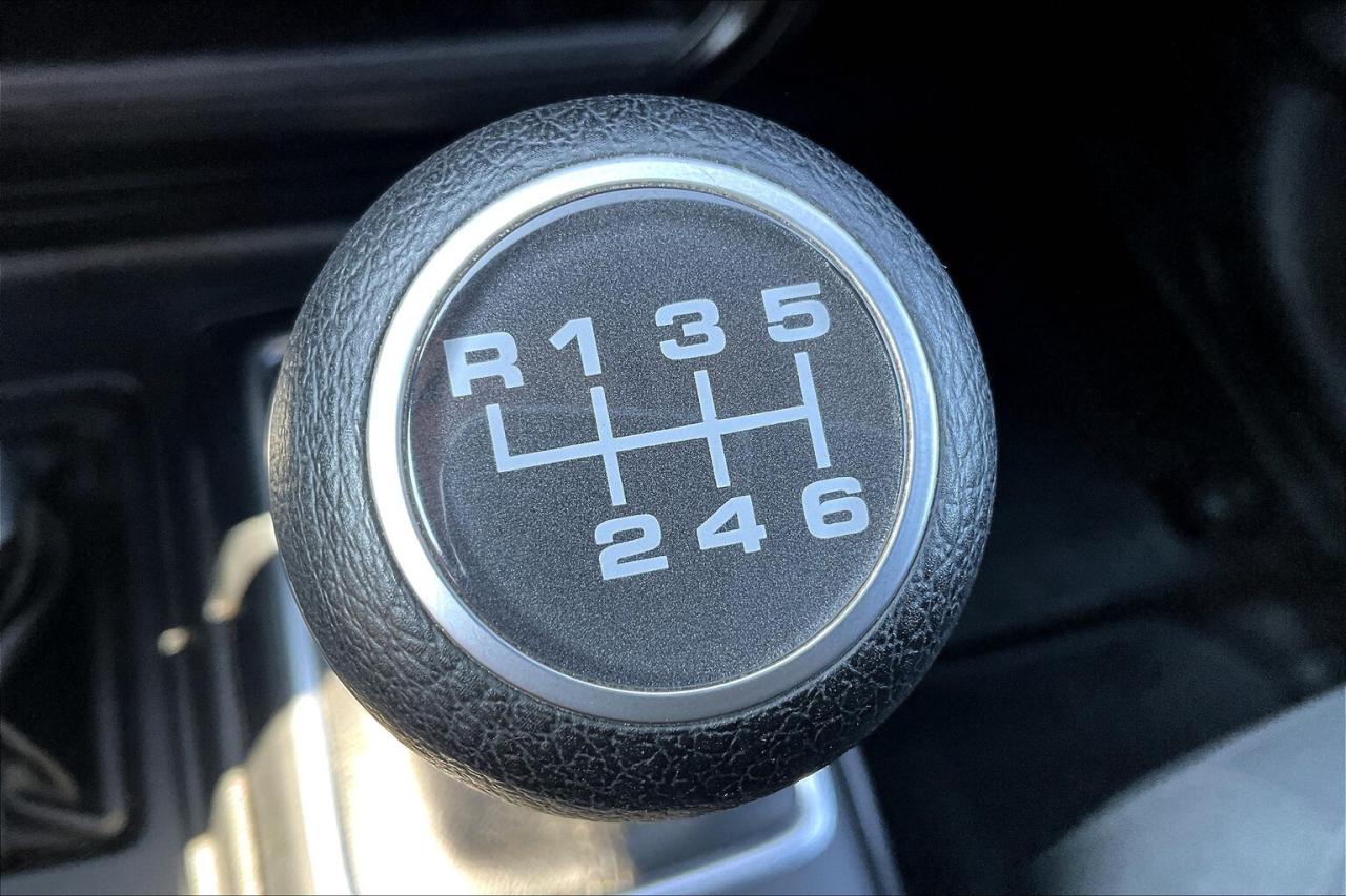 12710340