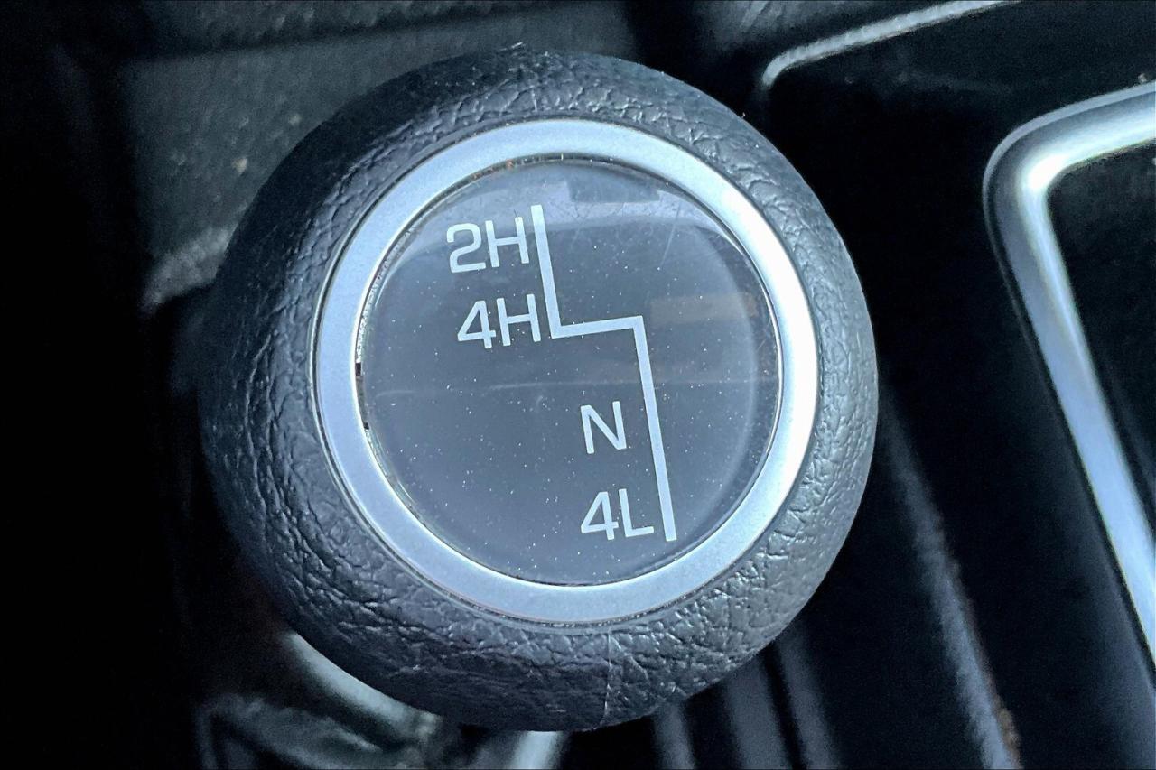 12710340