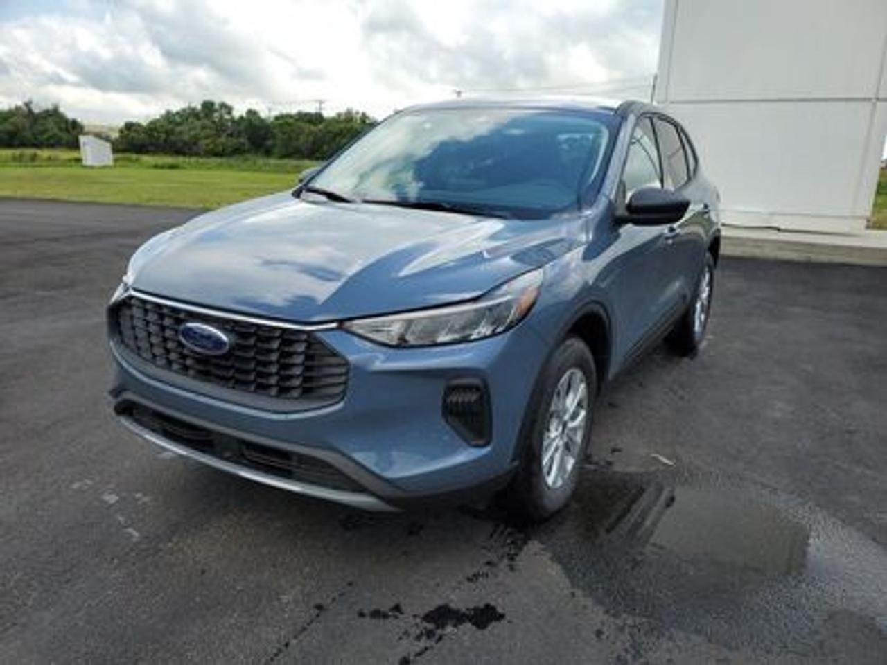 This all-new 2025 Escape Active 200A looks absolutely stunning in Vapor Blue Metallic. This 5-passenger All-wheel drive crossover comes equipped with the 1.5L EcoBoost® engine. This remarkable engine not only produces 181 horsepower and 190 ft-lbs of torque, but by leveraging EcoBoost® technology and an 8-speed automatic transmission, this crossover is rated to get an estimated 8.4L/100km (34 miles per gallon) combined highway/city fuel economy.

Key Features:
8 Instrument panel cluster
 All-wheel drive
Ford Co-Pilot360
Heated Front Seats
Remote Start
Heated Mirrors
SYNC® 4 W/8 LCD Capacitive Touchscreen
Wireless Apple CarPlay® and Android Auto Compatibility
Privacy Glass
17 Shadow Silver Painted Aluminum Wheels
Power Windows
LED Taillamps
LED Headlamps
FordPass Connect
Mini Spare Wheel/Tire

Moose Jaw Ford, conveniently located at 1010 North Service Road in Moose Jaw, is your trusted destination for all your automotive needs. With an impressive 4.8-star Google rating from nearly 1,500 reviews, we are proud to deliver an exceptional vehicle-buying experience tailored just for you. Our Moose Jaw Motives set us apart, offering unbeatable value like half-priced oil changes for life on pre-owned vehicles, one year of key and remote protection, and one year of tire and rim protection. Enjoy peace of mind with every purchase. At Moose Jaw Ford, were committed to driving positive change in our community by combining exceptional service, high-quality vehicles, and a guest-first approach. Visit us today!