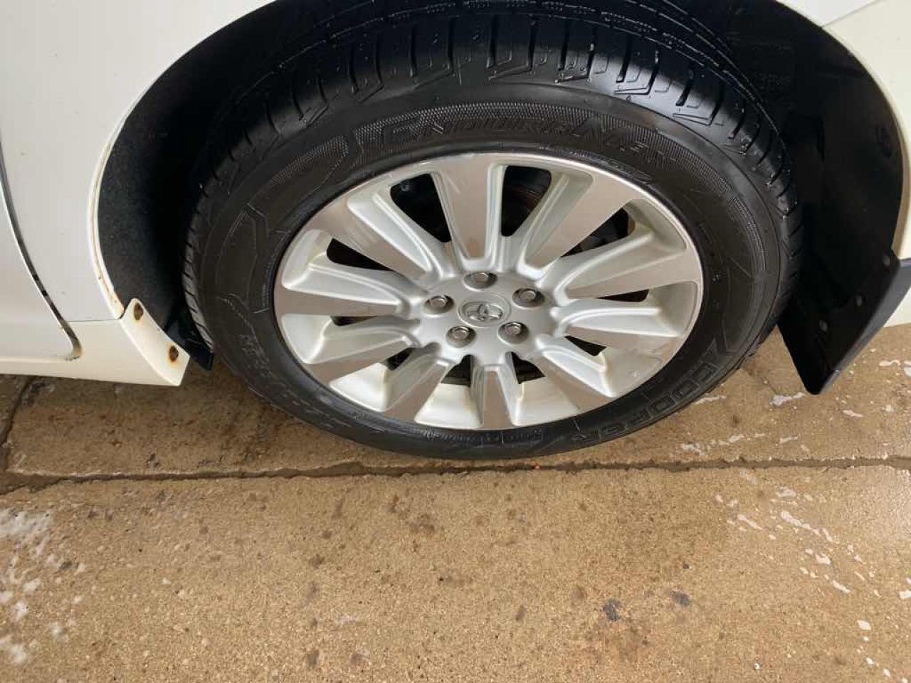 12712428