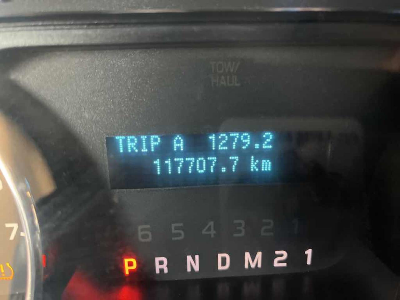 12712449