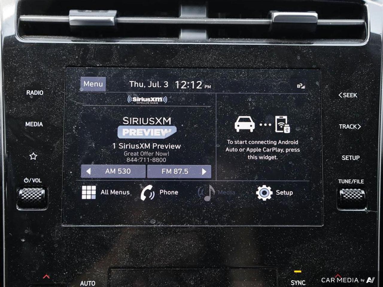 12712989
