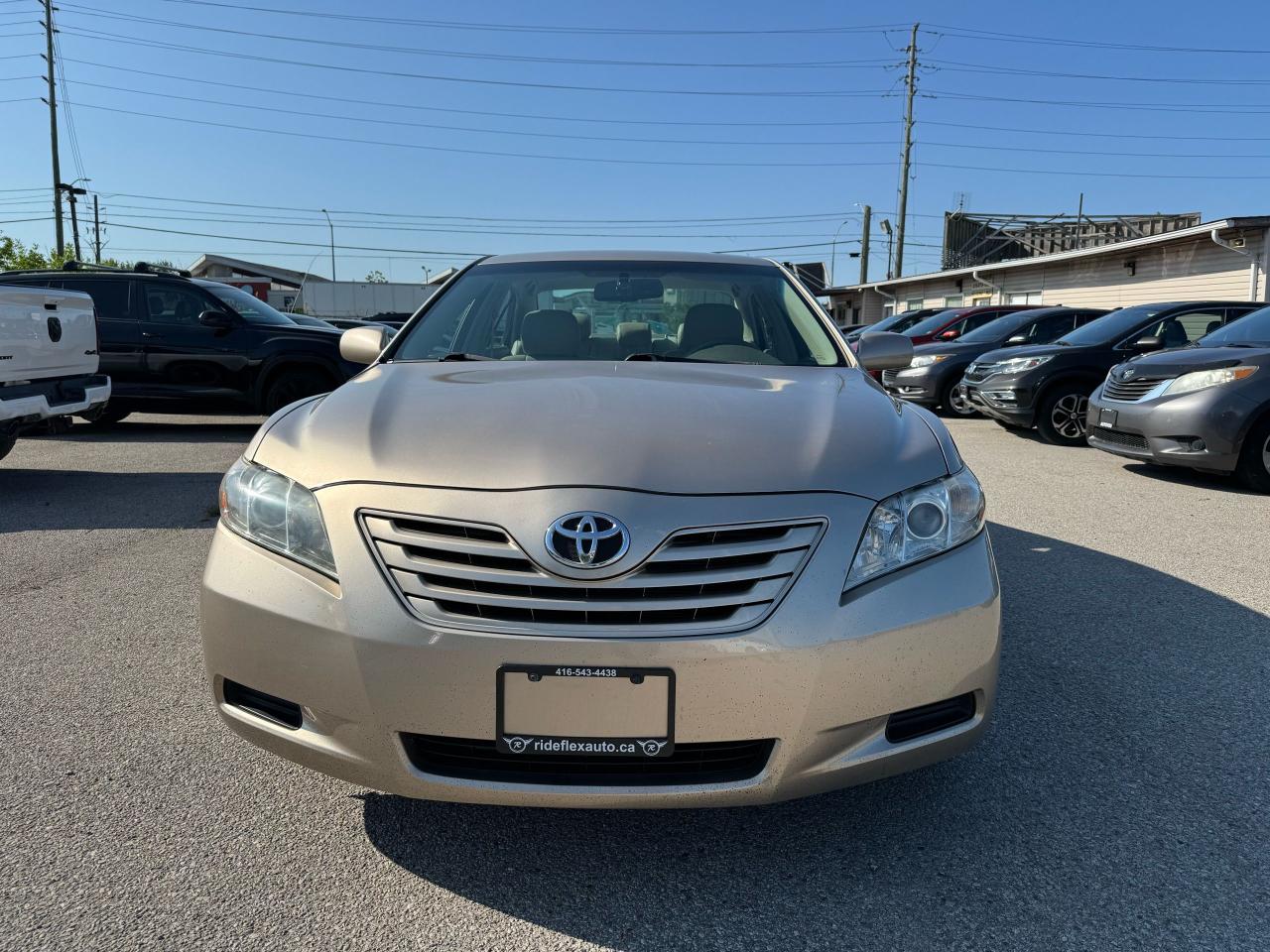 2009 Toyota Camry LE - Photo #2