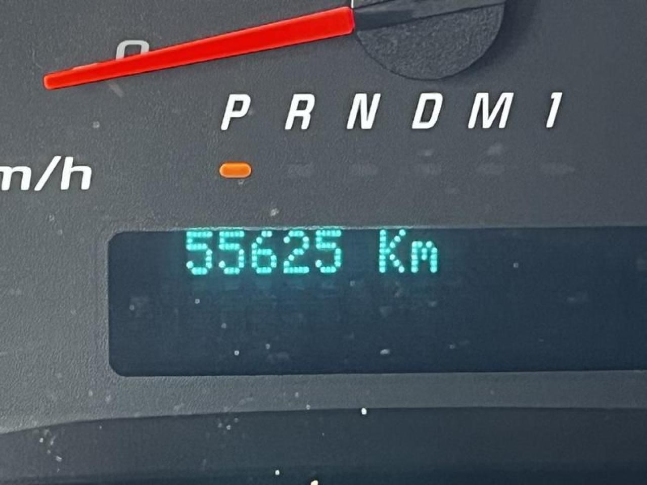 12715701