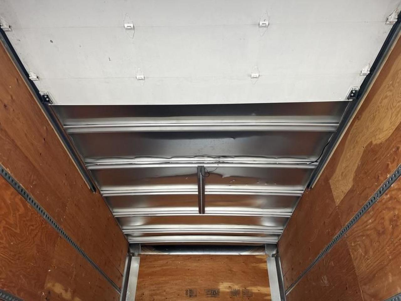 12715701
