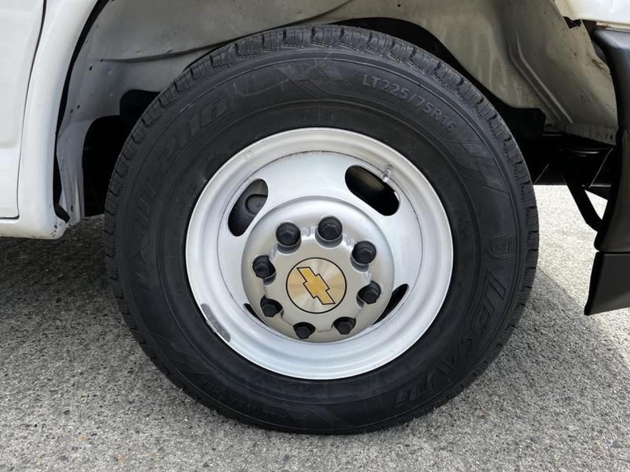 12715701