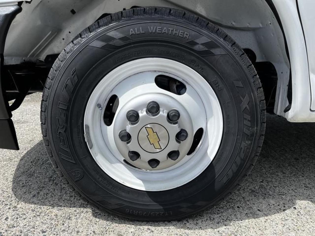 12715701
