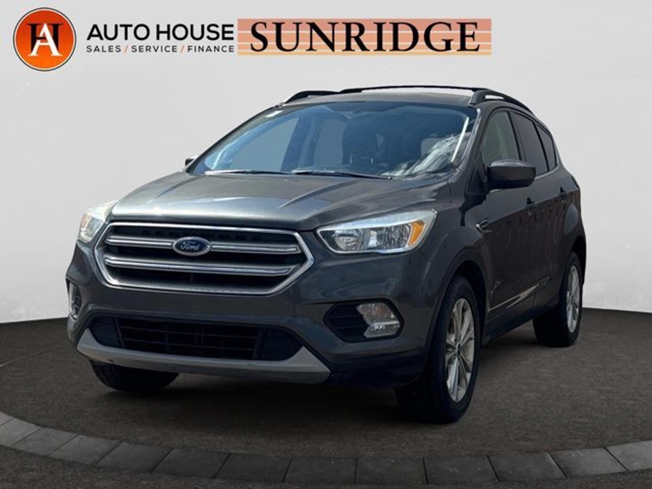 2017 FORD ESCAPE SE WITH 117790 KMS, BACK UP CAMERA, HEATED FRONT SEATS, AUTO STOP/START, HEATED MIRRORS, BLUETOOTH, USB/AUX, POWER WINDOWS LOCK SEATS AND MANY MORE!.ALL CREDIT ACCEPTED!One month at a job? Bankruptcy? New to Canada? Collections? Student or work visas? Previous repossessions? Good or bad credit? Weve got you covered! Get pre-approved today at www.autoshouse.com!What We Offer:*Low Bi-Weekly Payments*Instant Approvals*Credit Consolidation*Employment Insurance*Negative Equity CoverageOperating Hours:Mon-Thurs: 10 am -- 8 pmFri-Sat: 10 am -- 6 pmCall 403-263-4446! All vehicles come with a full mechanical fitness assessment.CARFAX IS AVAILABLE TO THE CONSUMER.Referral Program:Refer friends and family and earn $500 for each referral!AMVIC Licensed DealerAfter a credit check, we can determine payments, APR, terms, and interest rates based on your credit (O.A.C). Individual credit will affect bi-weekly payments and the total cost of credit . Newer Vehicles May Come With Apple Carplay, Android Auto. Similar to Chevrolet, GMC, Honda, Toyota, Cadillac, Nissan, Ford, Volvo 2007, 2008, 2009, 2010, 2011, 2012, 2013, 2014, 2015, 2016, 2017, 2018Location: 2404 23rd Ave. N.E. Calgary AB, T2E 8J4All photos are of the vehicle featured in the advertisement.