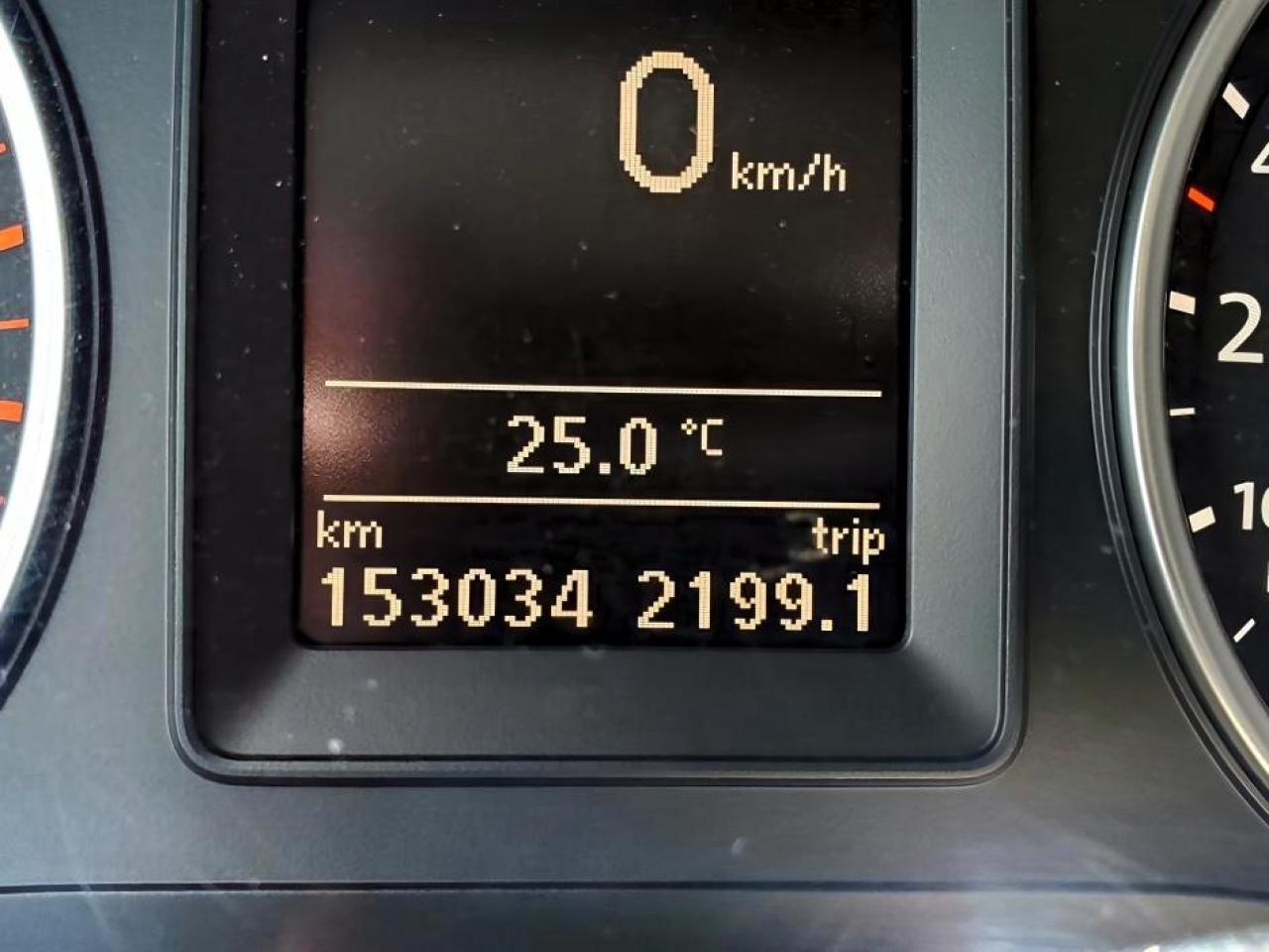 12718377