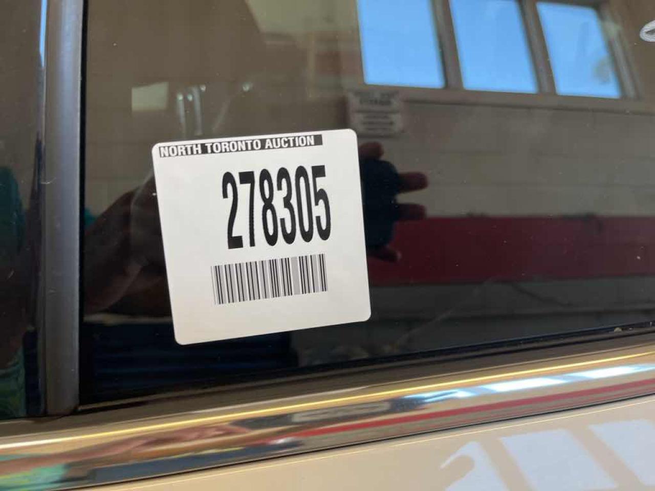 12718977