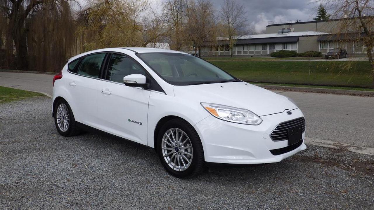 2013 Ford Focus Electric Car, ELECTRIC, 4 door, automatic, FWD, cruise control, air conditioning, AM/FM radio, power door locks, power windows, power mirrors, white exterior, gray interior, cloth.  $6,850.00 plus $375 processing fee, $7,225.00 total payment obligation before taxes.   Listing report, warranty, contract commitment cancellation fee, financing available on approved credit (some limitations and exceptions may apply). All above specifications and information is considered to be accurate but is not guaranteed and no opinion or advice is given as to whether this item should be purchased. We do not allow test drives due to theft, fraud, acts of vandalism and undetectable impaired driving. Instead we provide the following benefits: Complimentary Warranty (with options to extend), Limited Money Back Satisfaction Guarantee on Fully Completed Contracts, Contract Commitment Cancellation, and an Open-Ended Sell-Back Option. Ask seller for details or call 604-522-REPO(7376) to confirm listing availability.