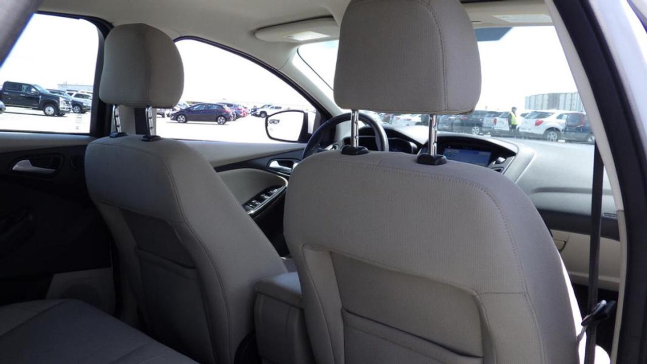 12721077