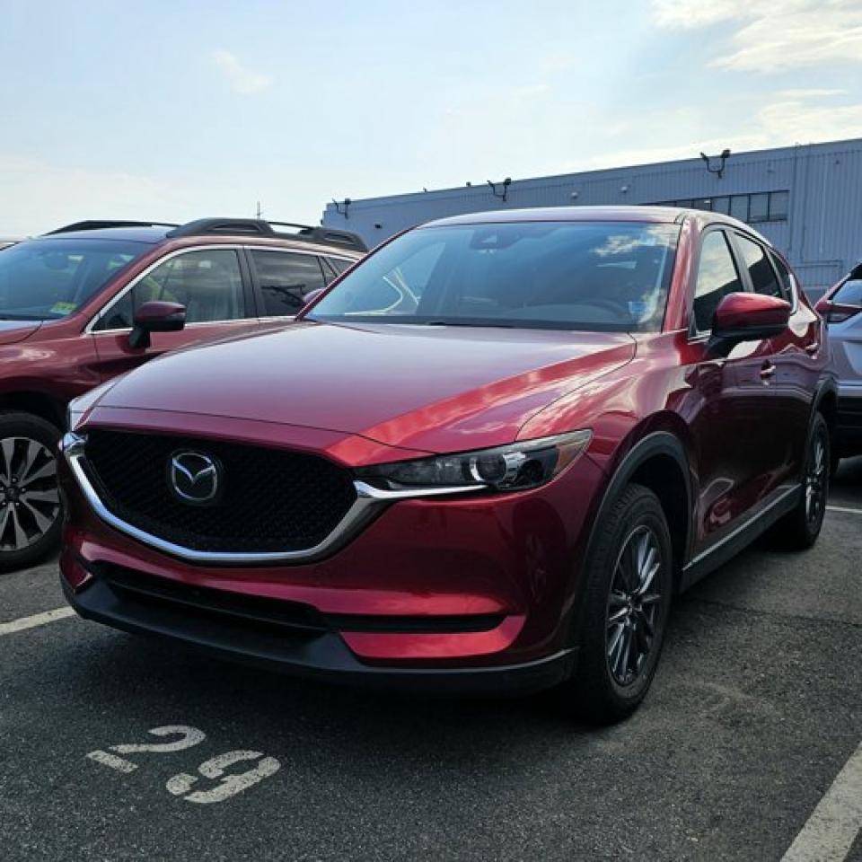 2019 MAZDA CX-5 GSEnjoy the perfect blend of style, performance, and comfort with the 2019 Mazda CX-5 GS, a versatile SUV now available at Steele Subaru in Halifax. This CX-5 impresses with its dynamic handling and premium features designed to enhance every drive.Equipped with a responsive 2.5L 4-cylinder engine and intelligent all-wheel drive, it delivers smooth, confident performance in all conditions. The well-appointed interior includes heated front seats, a power drivers seat with lumbar support, dual-zone automatic climate control, and a leather-wrapped steering wheel. Stay connected with the user-friendly infotainment system featuring a touchscreen display, Apple CarPlay, Android Auto, Bluetooth, and a rear-view camera.With its attractive design and advanced safety features like blind-spot monitoring and rear cross-traffic alert, this CX-5 GS is ready for your next adventure.Contact Steele Subaru today at 902-407-8707 to schedule a test drive!STEELE CERTIFIEDThis vehicle is Steele Certified, having successfully passed a comprehensive 120-Point Inspection to ensure quality and peace of mind. A current service and Nova Scotia Motor Vehicle Inspection (MVI) has been completed, so its ready for the road. We also provide a Carfax Vehicle History Report for full transparency. Buy with confidence knowing this vehicle has been thoroughly checked by our factory-trained technicians. Trade-ins are always welcome, and were here to help make your next vehicle purchase smooth and worry-free.All Wheel Drive, 6 Speakers, Air Conditioning, Alloy wheels, AppLink/Apple CarPlay and Android Auto, Auto High-beam Headlights, Auto-dimming Rear-View mirror, Emergency communication system, Exterior Parking Camera Rear, Fully automatic headlights, Heated Front Seats, Heated steering wheel, Lane Departure Warning System, Leatherette Upholstery, Power driver seat, Power Liftgate, Radio: AM/FM/HD w/6 Speakers, Rain sensing wipers, Steering wheel mounted audio controls, Telescoping steering wheel, Tilt steering wheel.