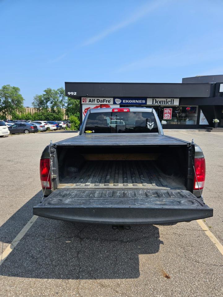 2011 RAM 1500 4WD QUAD CAB 140.5" ST - Photo #14