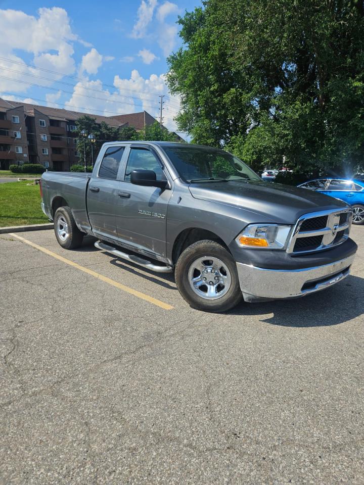 2011 RAM 1500 4WD QUAD CAB 140.5" ST - Photo #9