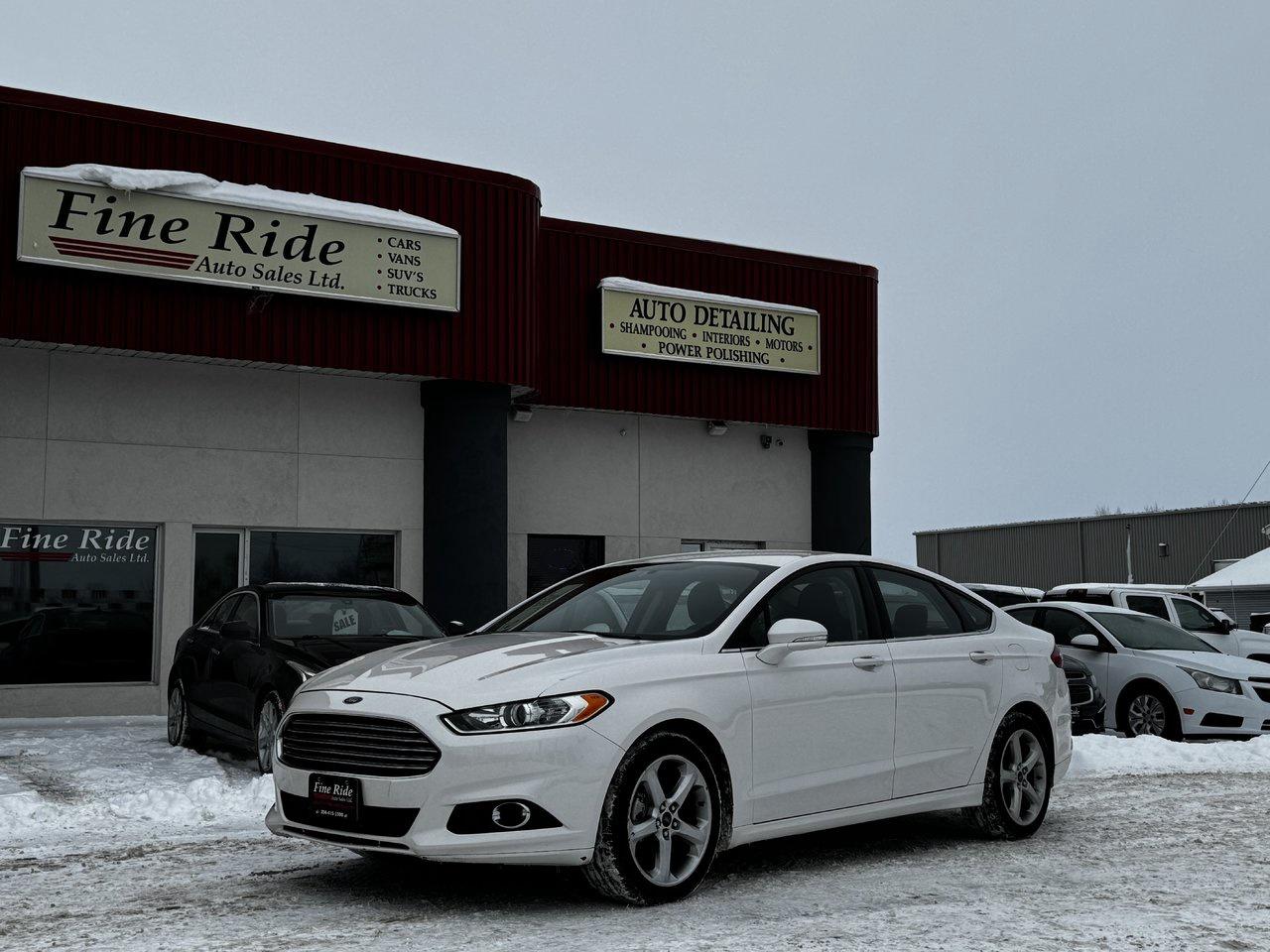 <p>2016 Ford Fusion SE AWD</p><p>2.0LTR 4cyl turbo<br>A/C<br>Telescopic tilt steering<br>Power windows<br>Power locks<br>Power mirrors<br>Power-heated seats<br>5 passengers<br>212,000kms!<br>AM/FM radio<br>SYNC by Microsoft / Bluetooth<br>Remote starter<br>Back up camera & sensors<br>Alloy wheels<br>Fog lights<br>Economical transportation<br>Original Manitoba car!</p><p>$10,975 Safetied<br>Financing and Warranty Available at Fine Ride Auto Sales Ltd<br>www.FineRideAutoSales.ca</p><p>Call: 204-415-3300 or 1-855-854-3300<br>Text: 204-226-1790<br>View in person at: Unit 3-3000 Main Street</p><p>DLR# 4614<br>**Plus applicable taxes**</p><p></p><p style=text-align:center;><span style=color:#000000;><span style=font-family:book antiqua, palatino, serif;font-size:14pt;>Monday                9am to 6pm</span></span><br><span style=color:#000000;><span style=font-family:book antiqua, palatino, serif;font-size:14pt;>Tuesday               9am to 6pm</span></span><br><span style=color:#000000;><span style=font-family:book antiqua, palatino, serif;font-size:14pt;>Wednesday               9am to 6pm</span></span><br><span style=color:#000000;><span style=font-family:book antiqua, palatino, serif;font-size:14pt;>Thursday                9am to 6pm</span></span><br><span style=color:#000000;><span style=font-family:book antiqua, palatino, serif;font-size:14pt;>Friday                9am to 5pm</span></span><br><span style=color:#000000;><span style=font-family:book antiqua, palatino, serif;font-size:14pt;>Saturday                             10am to 2pm</span></span><br><span style=color:#000000;><span style=font-family:book antiqua, palatino, serif;font-size:14pt;>Sunday                    CLOSED</span></span></p>