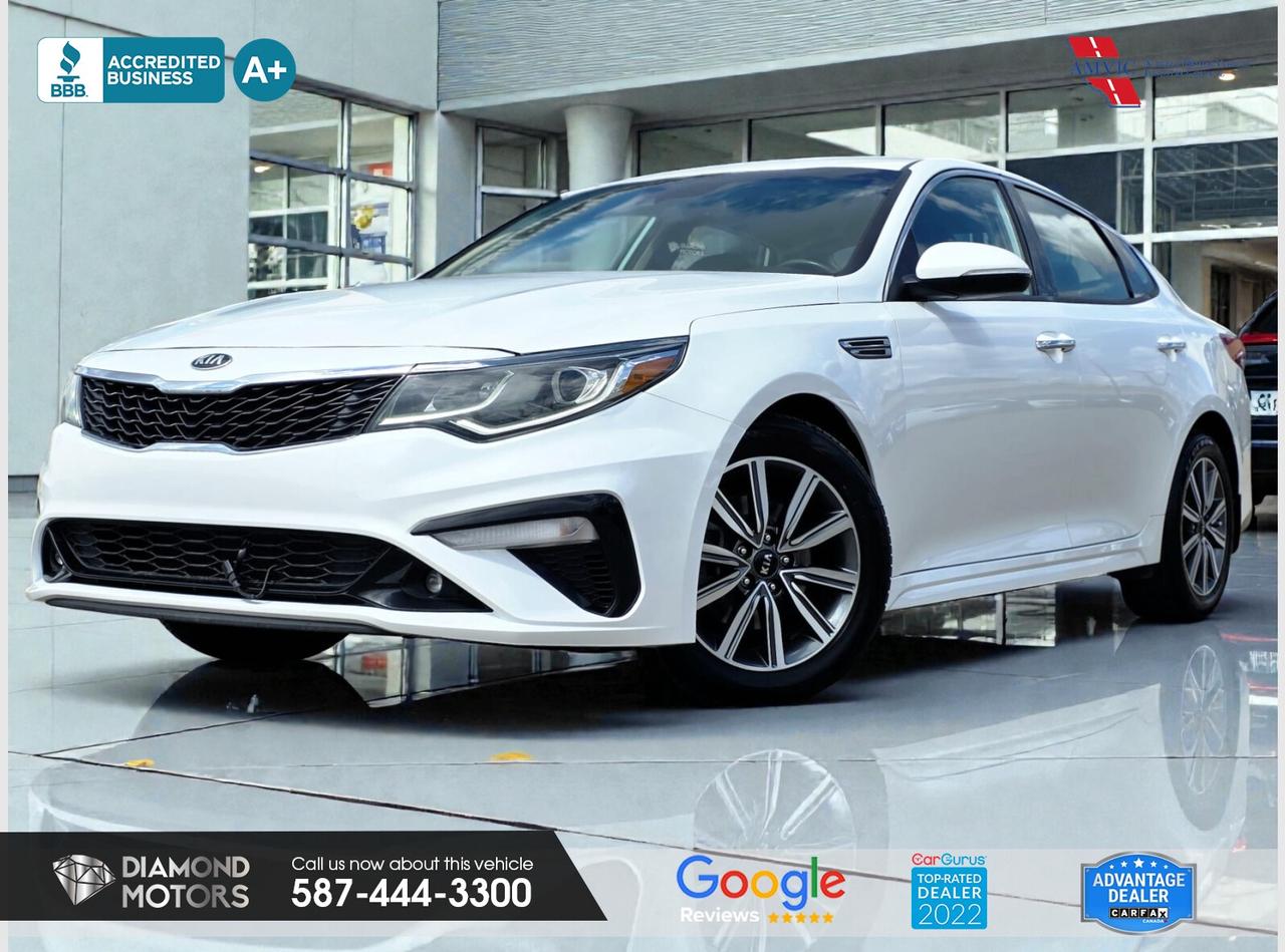 CLEARANCE PRICED  PRICED TO MOVE <br/> LIMITED TIME at Diamond Motors <br/> Drive away with a FREE 1-Year Warranty + low payments included at Listed Price. T&Cs Apply. <br/> 2.4L 4 CYLINDER ENGINE, NO ACCIDENTS, LEATHER, LANE ASSIST, BLIND SPOT MONITORING, HEATED SEATS, HEATED STEERING WHEEL, APPLECARPLAY/ANDROID AUTO, BACKUP CAMERA, AND MUCH MORE! <br/> <br/> <br/> Just Arrived 2020 KIA Optima EX White has 117,121 KM on it. 2.4L 4 Cylinder Engine engine, Front-Wheel Drive, Automatic transmission, 5 Seater passengers, on special price for $15,900.00. <br/> <br/> <br/> Book your appointment today for Test Drive. We offer contactless Test drives & Virtual Walkarounds. Stock Number: 25171 <br/> Disclosure: This vehicle was previously registered in MB & ON. Vehicle has passed all required inspections in Alberta. <br/> At Diamond Motors, we are dedicated to providing you with an outstanding car-buying experience, offering quality pre-owned vehicles at prices that fit your budget. Our transparent and honest approach means you can expect straightforward guidance without any high-pressure sales tactics. We believe in building lasting relationships with our customers by offering personalized service tailored to your needs. From the moment you step onto our lot, our team is here to support you every step of the way, ensuring you leave confident in your decision. Trust, integrity, and customer satisfaction are the foundation of everything we do. <br/> <br/> <br/> Why choose us? <br/> <br/> Certified Pre-Owned Vehicles <br/> Family Owned & Operated <br/> Finance Available <br/> Extended Warranty <br/> Vehicles Priced to Sell <br/> No Pressure Environment <br/> Inspection & Carfax Report <br/> Professionally Detailed Vehicles <br/> Full Disclosure Guaranteed <br/> AMVIC Licensed <br/> BBB Accredited Business <br/> CarGurus Top-rated Dealer 2022 & 2024 <br/> <br/> <br/> Phone to schedule an appointment @ 587-444-3300 or simply browse our inventory online www.diamondmotors.ca or come and see us at our location at <br/> 3403 93 street NW, Edmonton, T6E 6A4 <br/> <br/> <br/> To view the rest of our inventory: <br/> www.diamondmotors.ca/inventory <br/> <br/> <br/> This dealership provides all required disclosures in accordance with AMVIC regulations. A completed Mechanical Fitness Assessment and its associated inspection work order will be supplied with every vehicle. A Carfax (or equivalent) vehicle history report will also be provided, including available information on previous damage, accident history, stolen or salvage status, and jurisdictional records. <br/> Customers are encouraged to review all vehicle features, options, and equipment for accuracy prior to purchase. <br/>