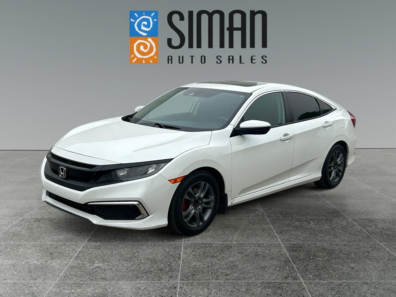 ## ?? **Clearance Deal! Accident-Free 2020 Honda Civic: Your Smartest Move on Wheels**

Tired of the endless car search? **Stop scrolling and start saving!** This meticulously maintained 2020 Honda Civic is now available at a special **Clearance Price of only $17,988!** Its more than just a carits the perfect blend of style, safety, and savings, now at an unbeatable price.

---

### **Why This Civic at This Price is an Absolute Steal**

* **?? Clearance Price: $17,988!** Take advantage of our low, no-haggle price and drive away in a premium pre-owned vehicle for less. This is a deal that wont last!
* **100% Accident-Free:** Drive with **absolute confidence**. This vehicle has a clean CARFAX report and has been thoroughly inspected to guarantee a spotless history.
* **Ready for Anything:** With a fresh, **full synthetic oil service** and a comprehensive pre-sale inspection, this Civic is fully serviced and prepared for its new owner.
* **Fuel Efficiency That Pays:** Enjoy superior fuel economy without sacrificing performance. This car is engineered to save you money at the pump, day after day.
* **Tech That Has Your Back:** Stay safe and comfortable with advanced features like **Distance-Pacing Adaptive Cruise Control** and Lane Departure Warning, designed to make every drive easier and more secure.
* **Luxury You Deserve:** Let the sunshine in with the **power sunroof**, adding a touch of open-air freedom and premium feel to your daily commute.
* **Built to Last:** Hondas legendary reliability means you can count on this car for years of worry-free ownership, handling daily life and weekend getaways with ease.

---

### **Dont Just Buy a Car, Join Our Family.**

At **Siman Auto Sales**, were not just selling carswere building relationships. As a family-owned and operated business serving Saskatchewan since 1998, weve built our reputation on **trust and care**. Were proud to be large enough to offer over 70 pre-owned vehicles, on-site financing, and trade-in support, yet small enough to give you the personal attention you deserve.

**Ready to get behind the wheel?**

* **On-Site Financing:** We make getting a loan easy, with options for every budget.
* **Trades Encouraged:** Get a great deal on your current vehicle and drive away in this Civic today.
* **Aftermarket Warranties:** Protect your investment with a variety of warranty options tailored to your needs.

Dont miss out on this fantastic **clearance opportunity**. **Check our reviews** and see why our customers trust us. This 2020 Honda Civic at **$17,988** is priced to move. Make your move today!