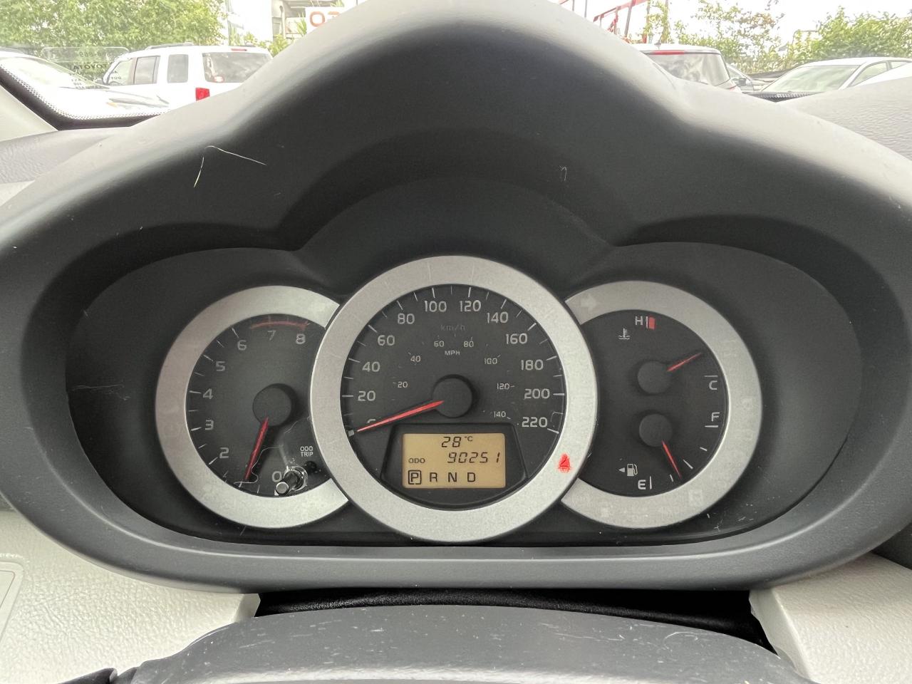 12729705