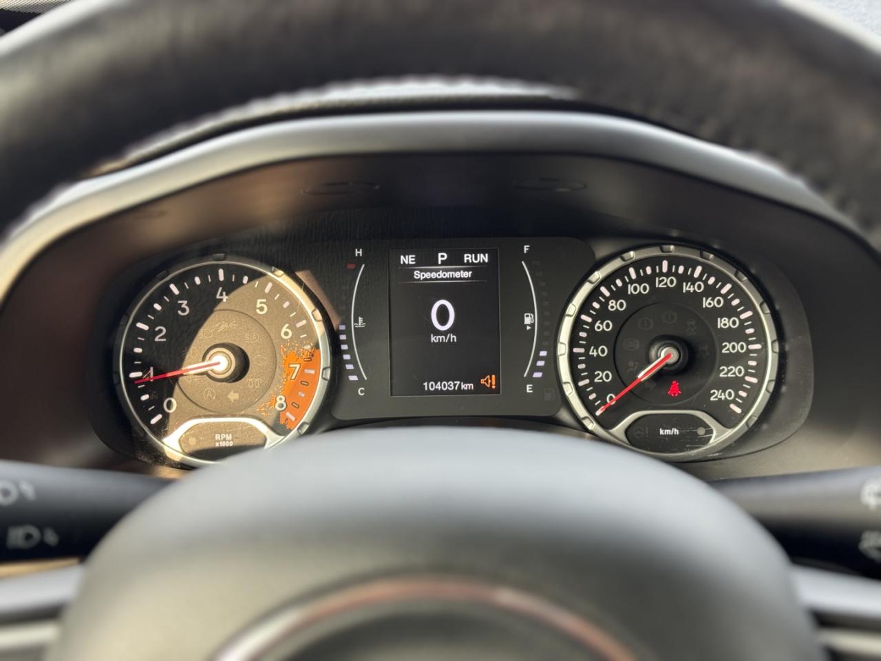 12729972