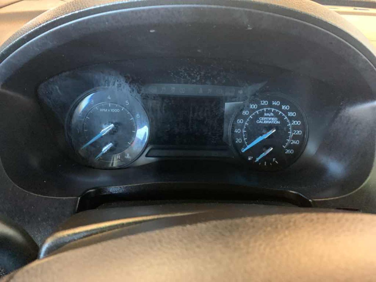 12730884