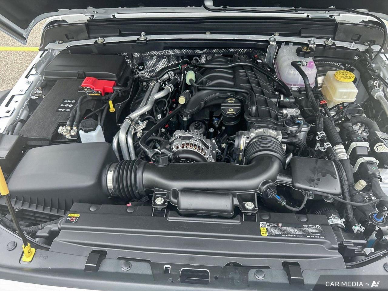 12731637