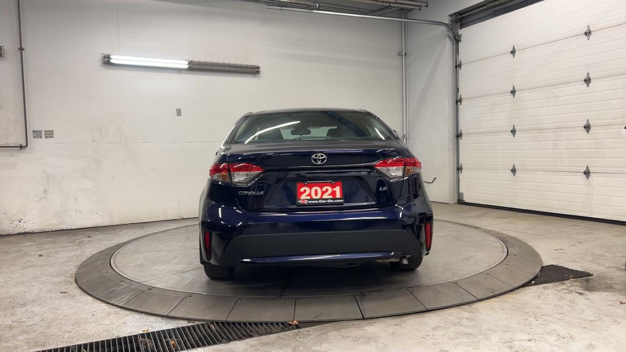 12732549