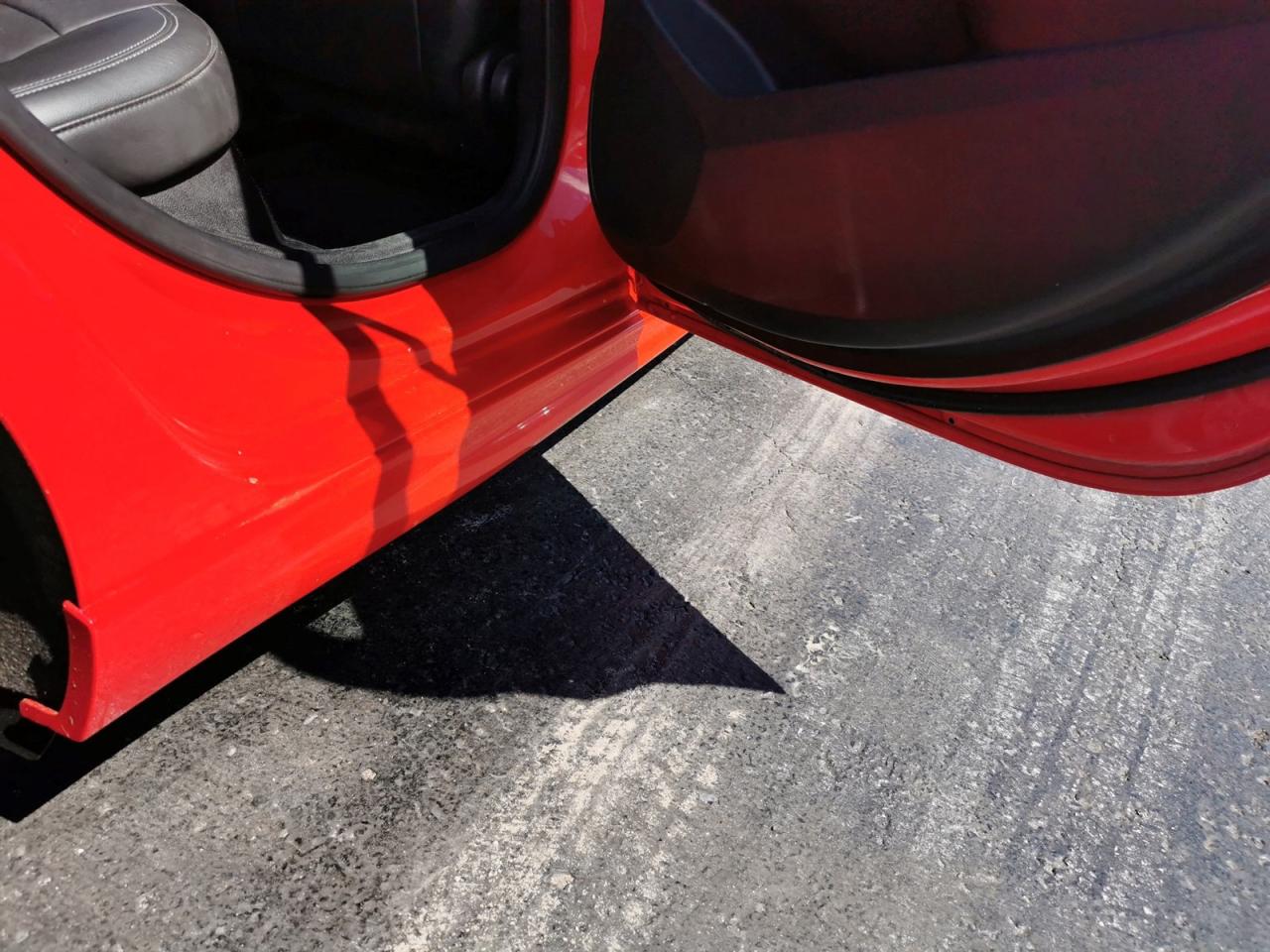 12733560