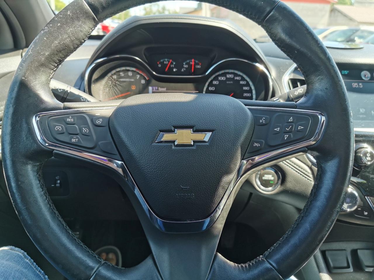12733560