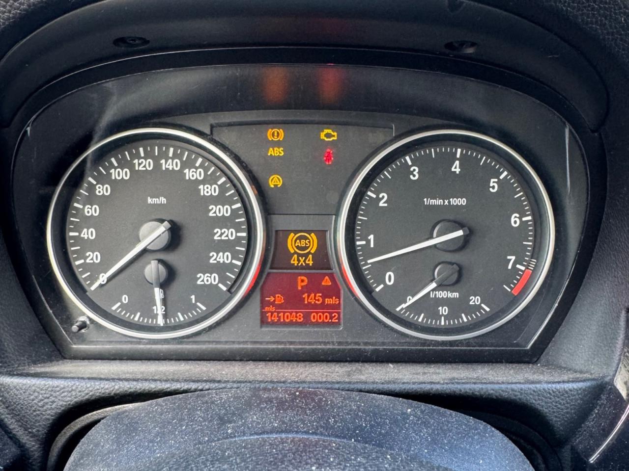 12733605