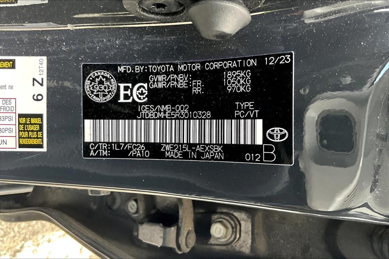 12734310