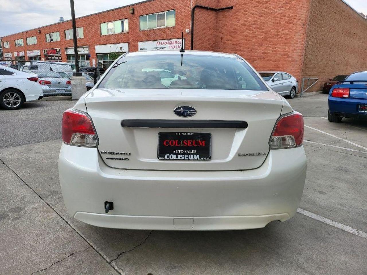 2014 Subaru Impreza TOURING PKG **5 SPD MANUAL** CERTIFIED-NO ACCIDENT Photo