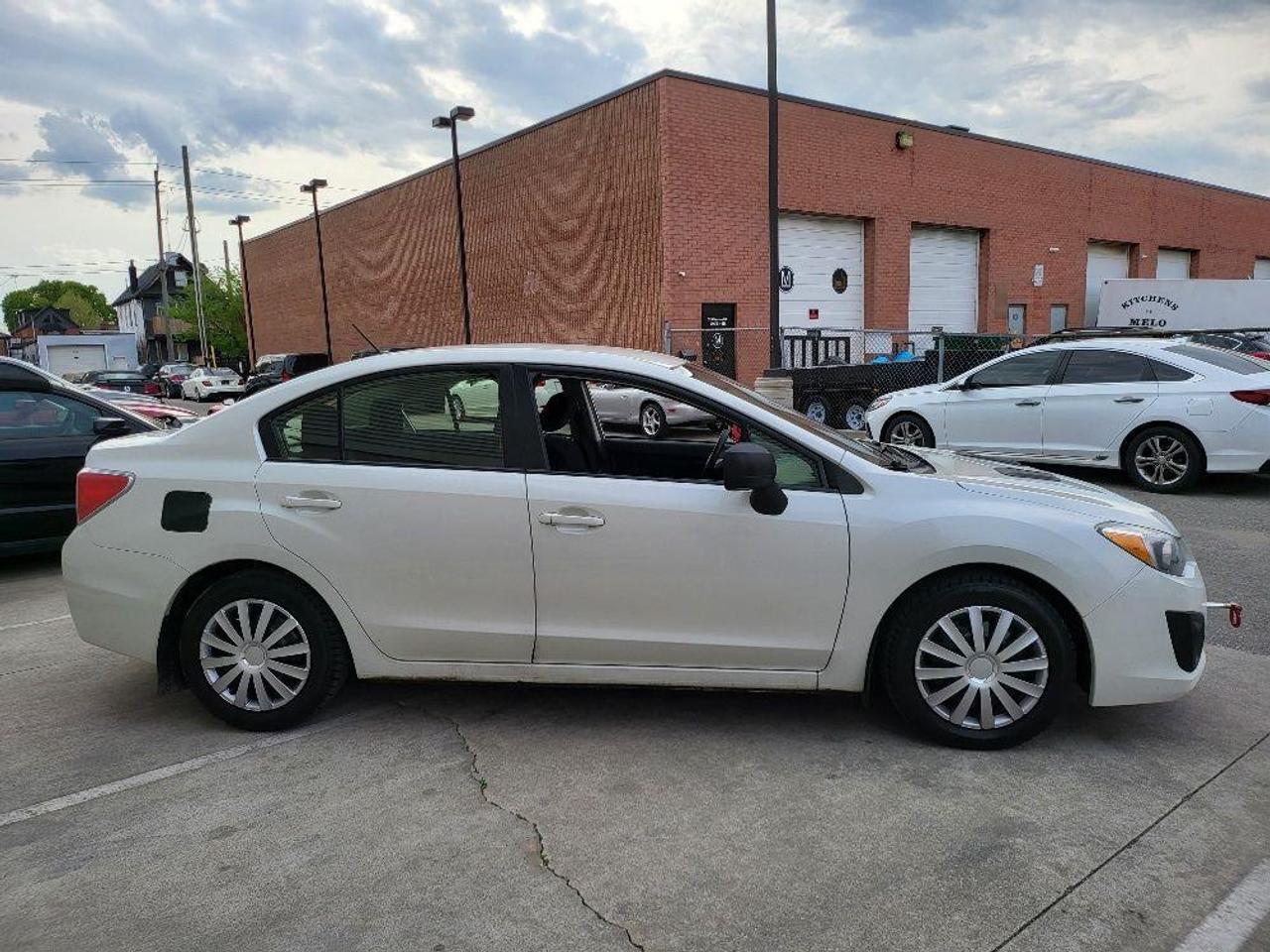 2014 Subaru Impreza TOURING PKG **5 SPD MANUAL** CERTIFIED-NO ACCIDENT Photo