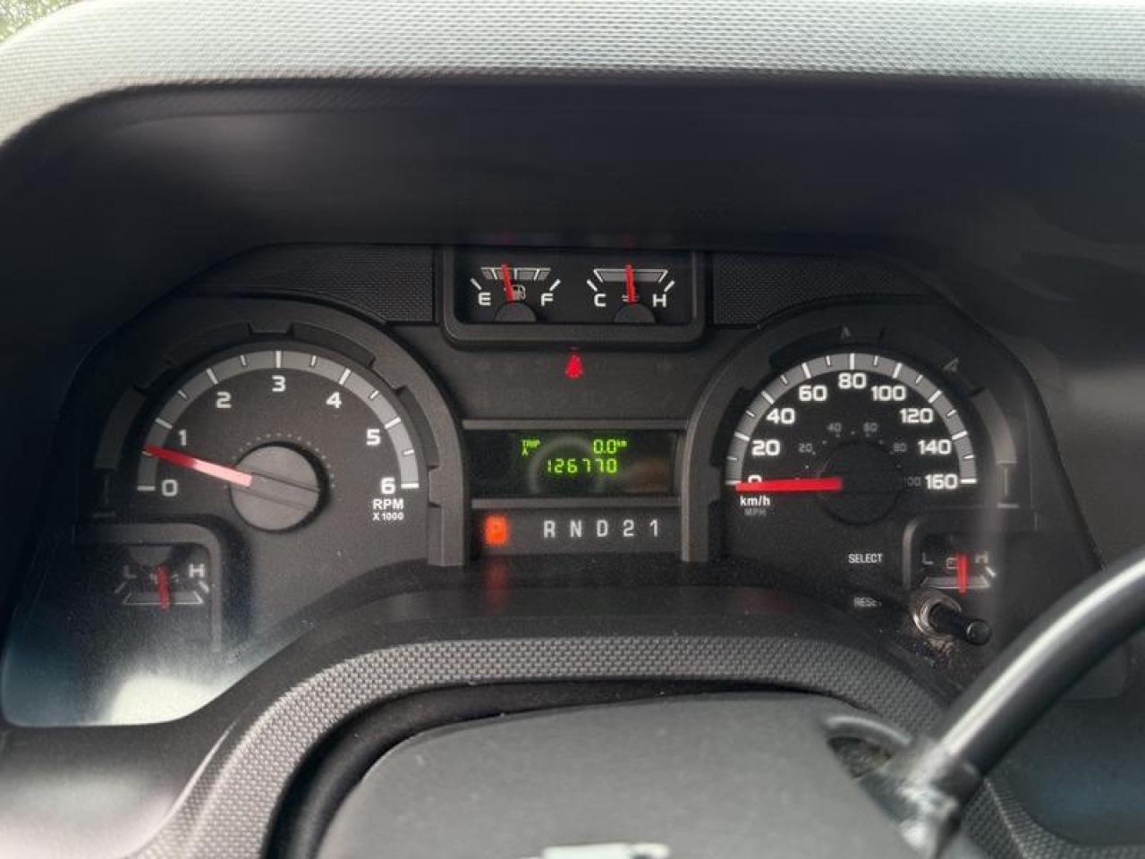 12737340