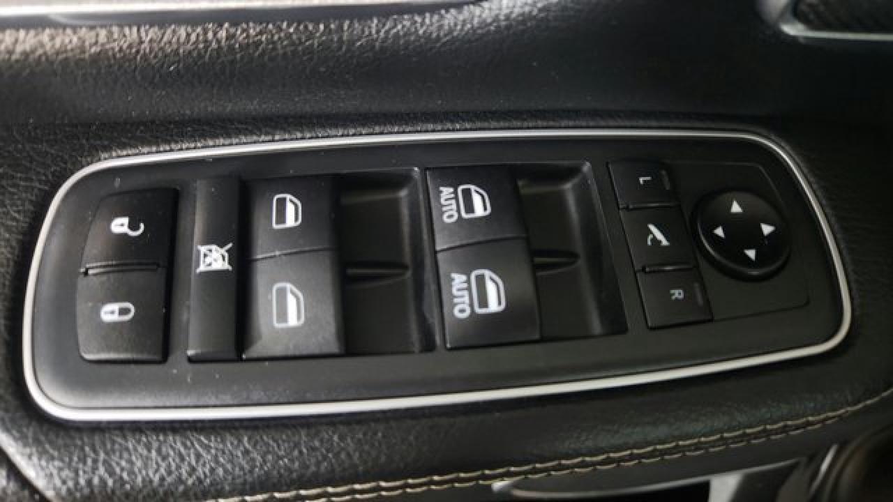 12737697