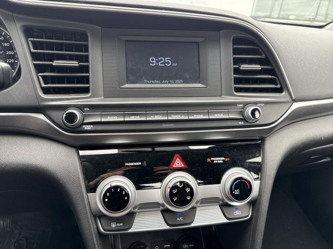 12737883