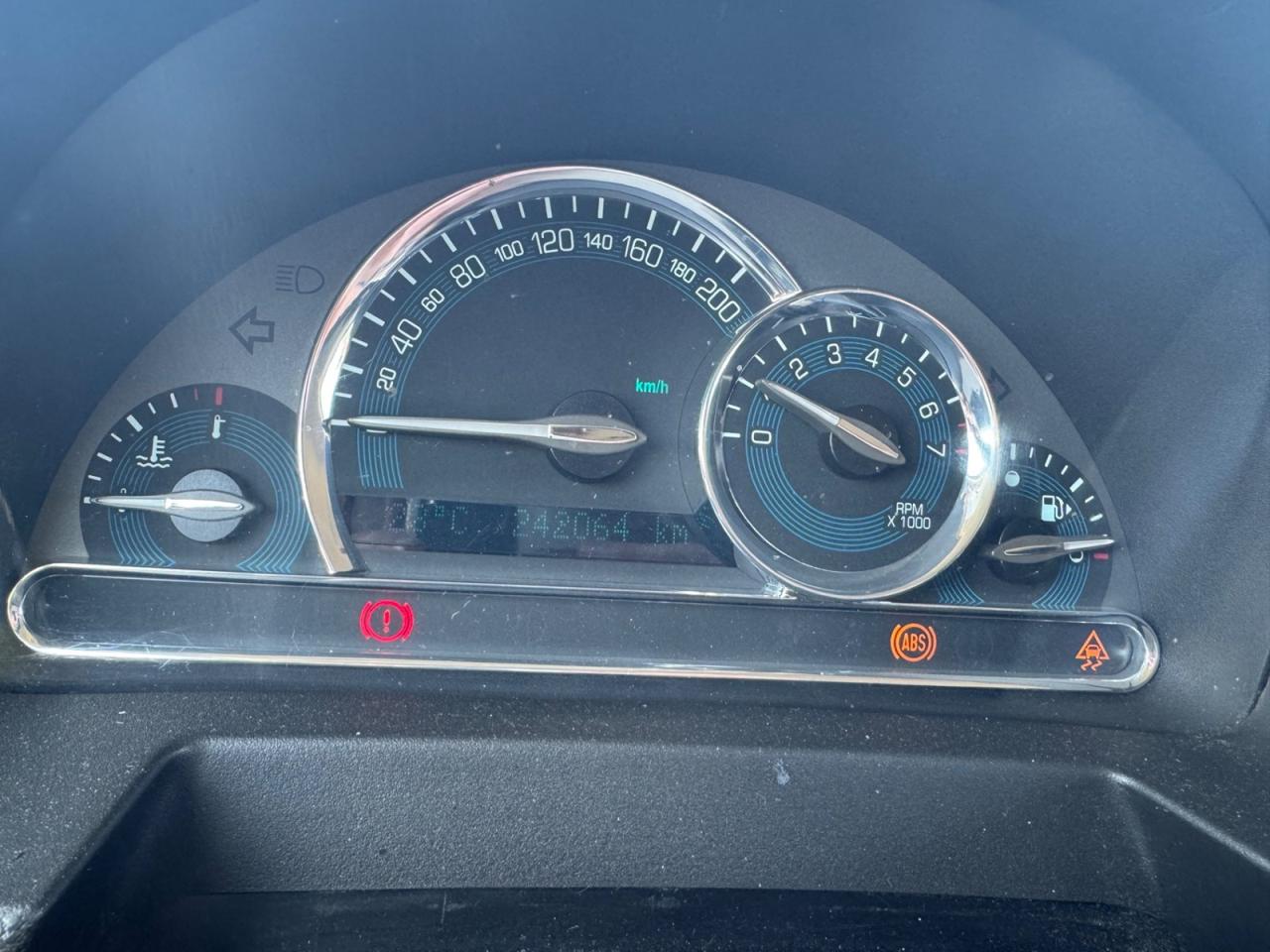 12738195