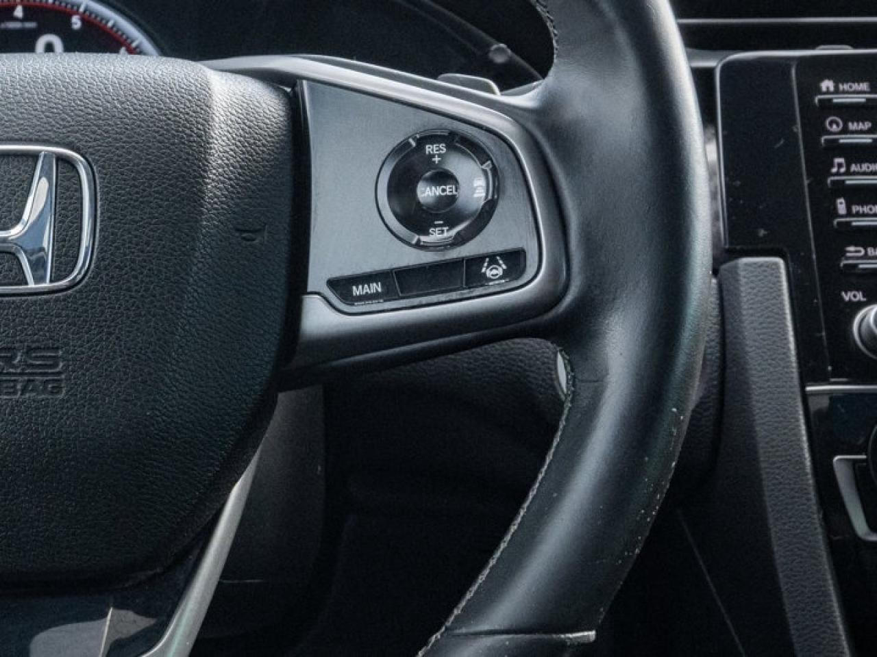12738564