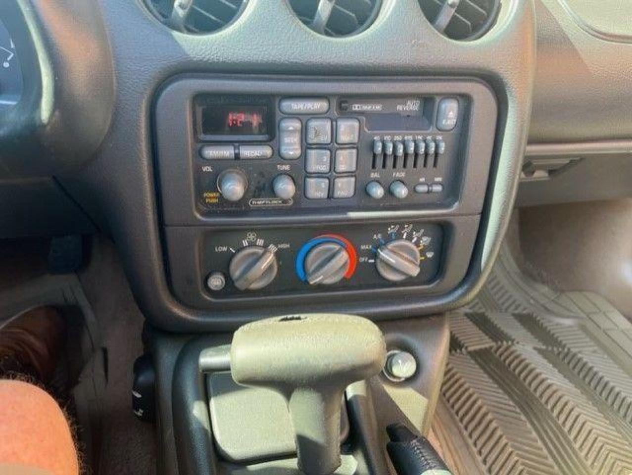 12739437