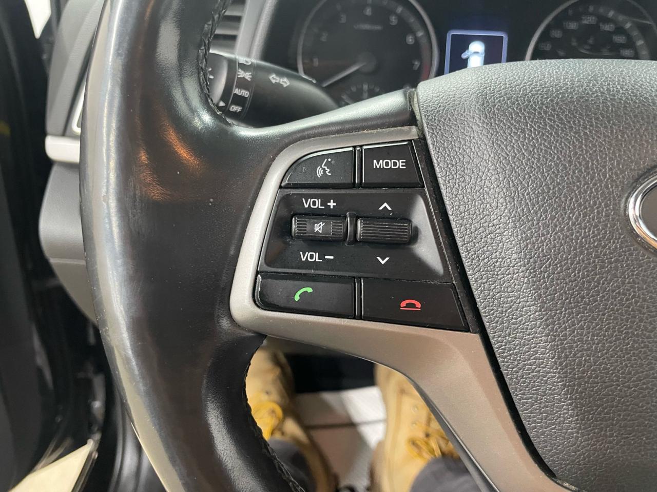 12740097