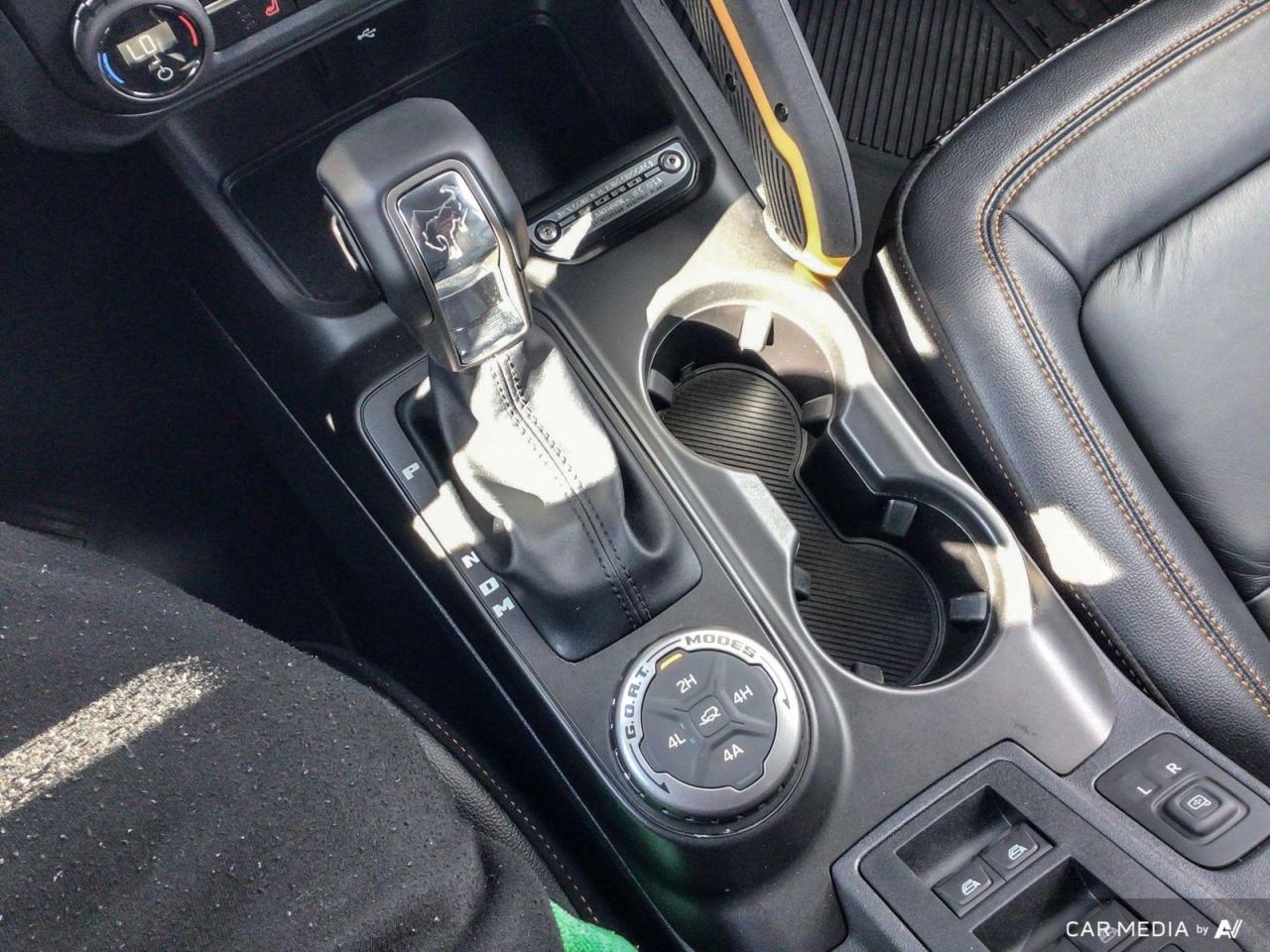 12740571