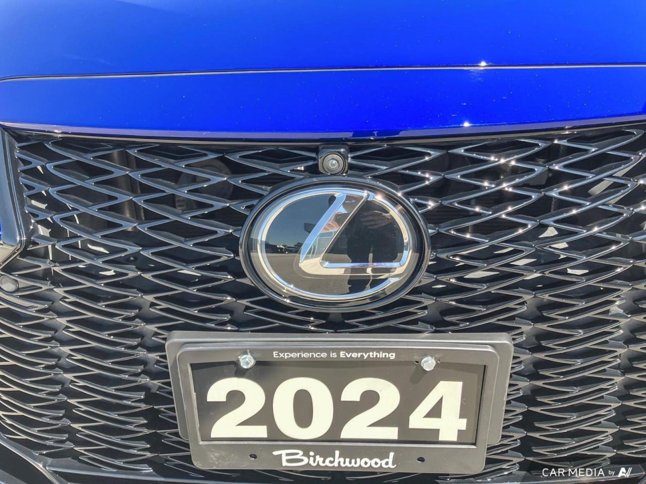 12740634
