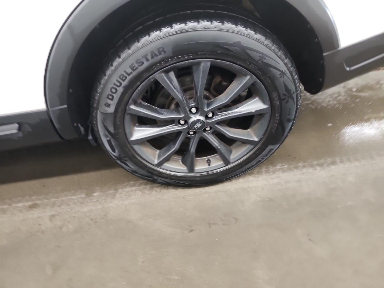 12741141