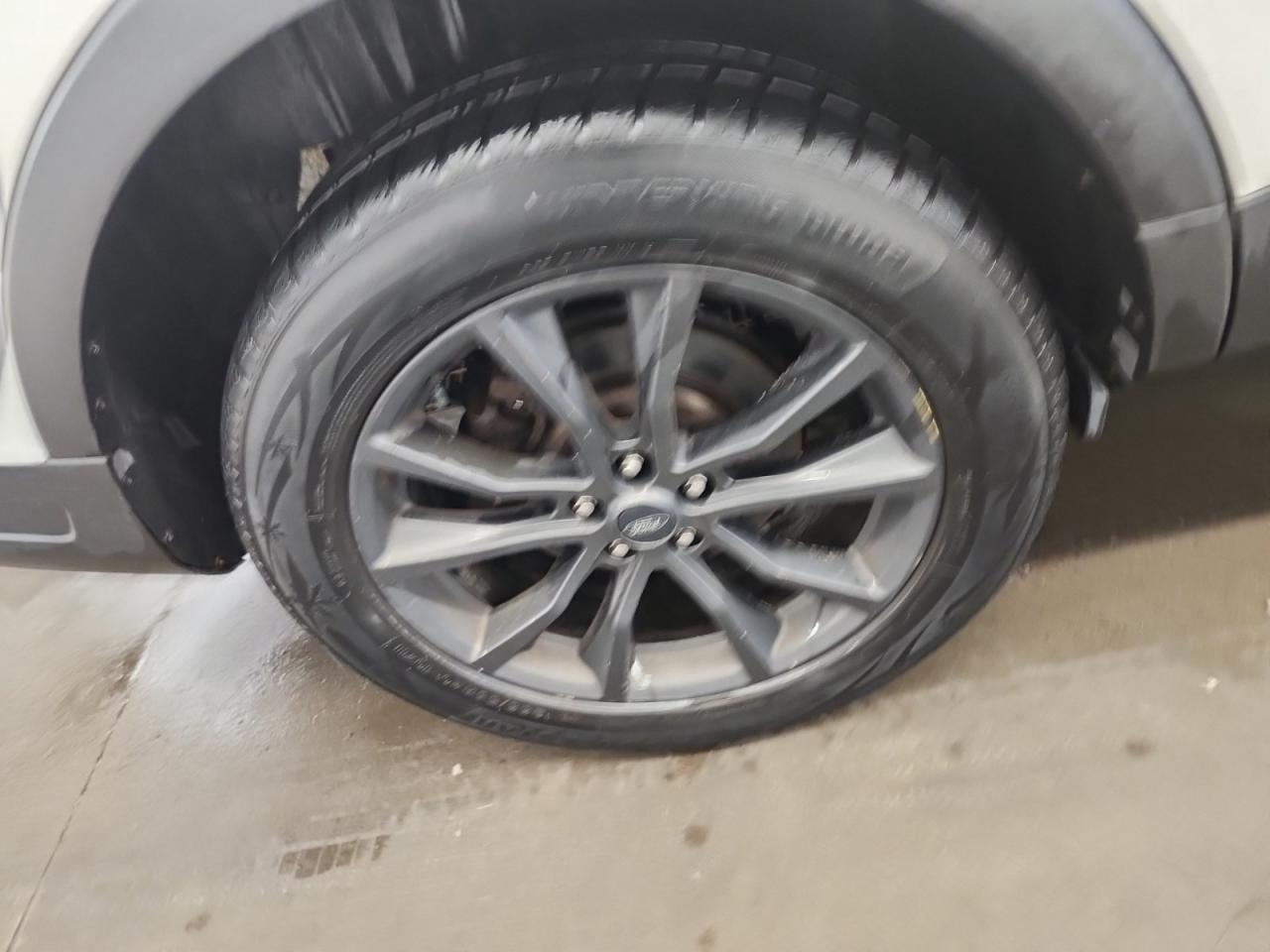 12741141