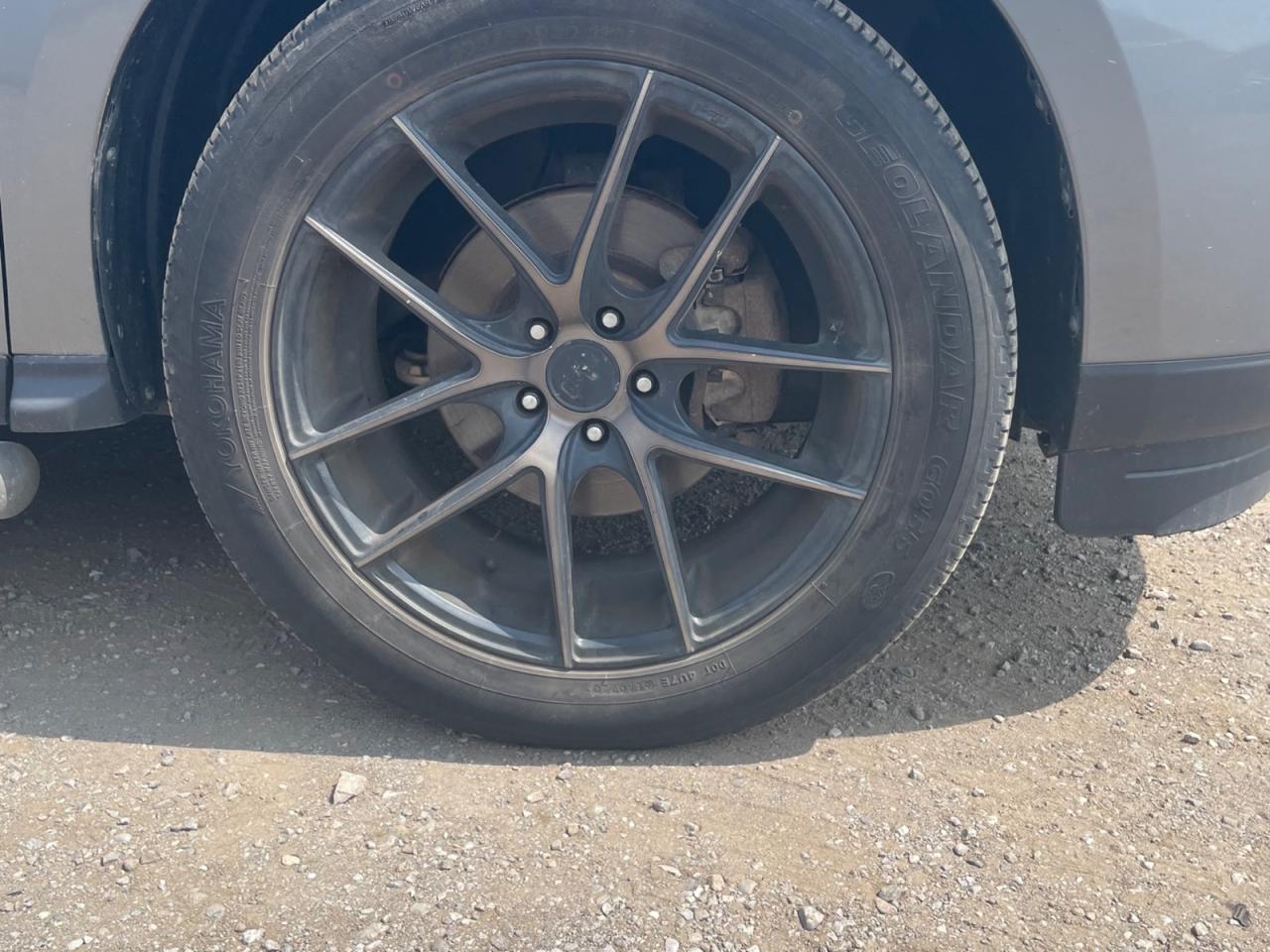12742566