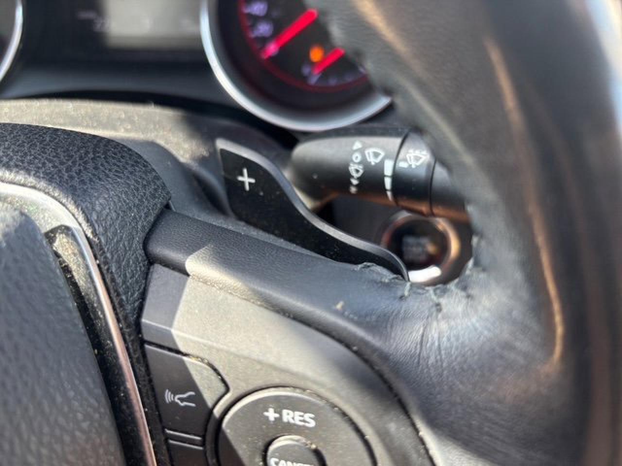 12743832