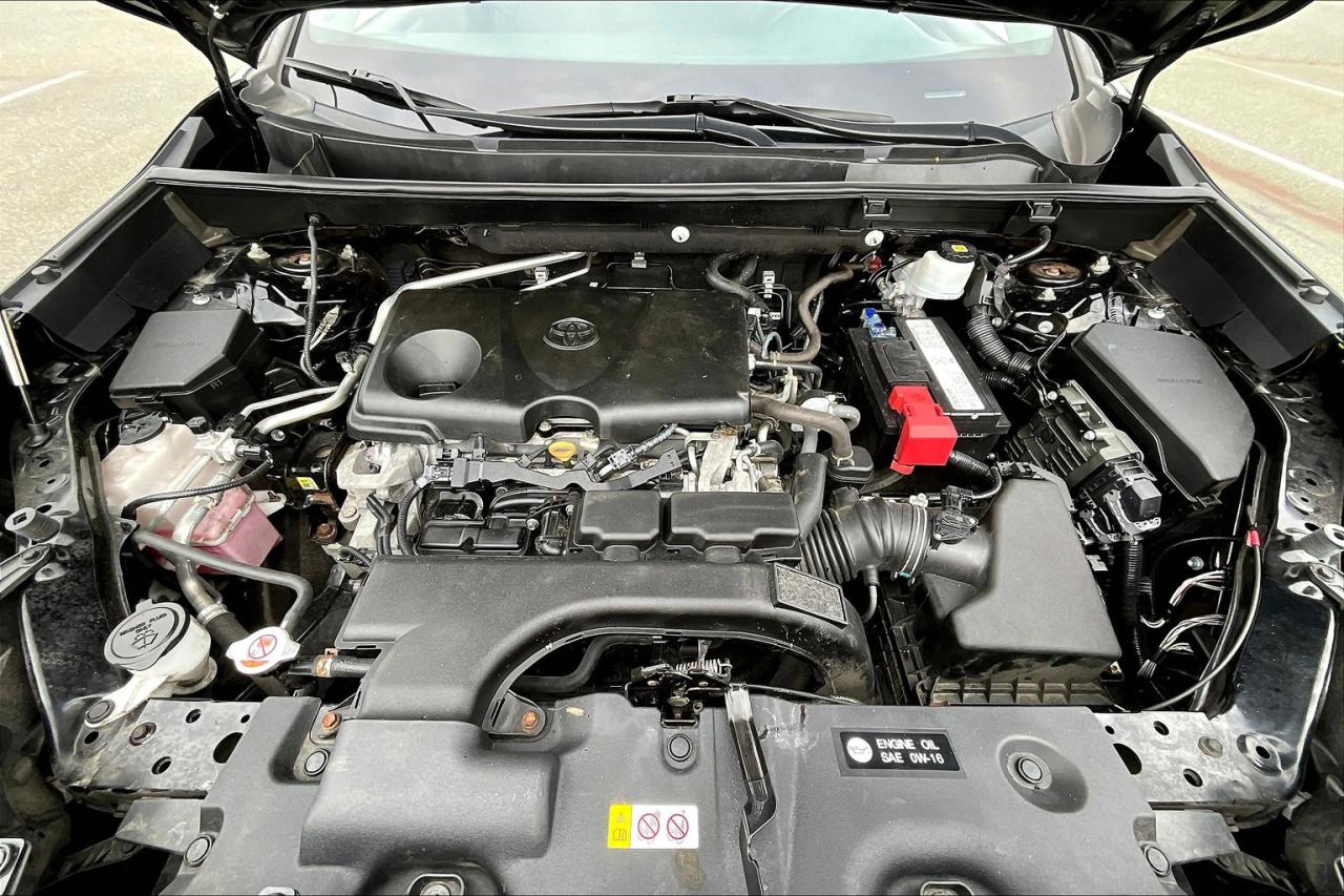 12743859