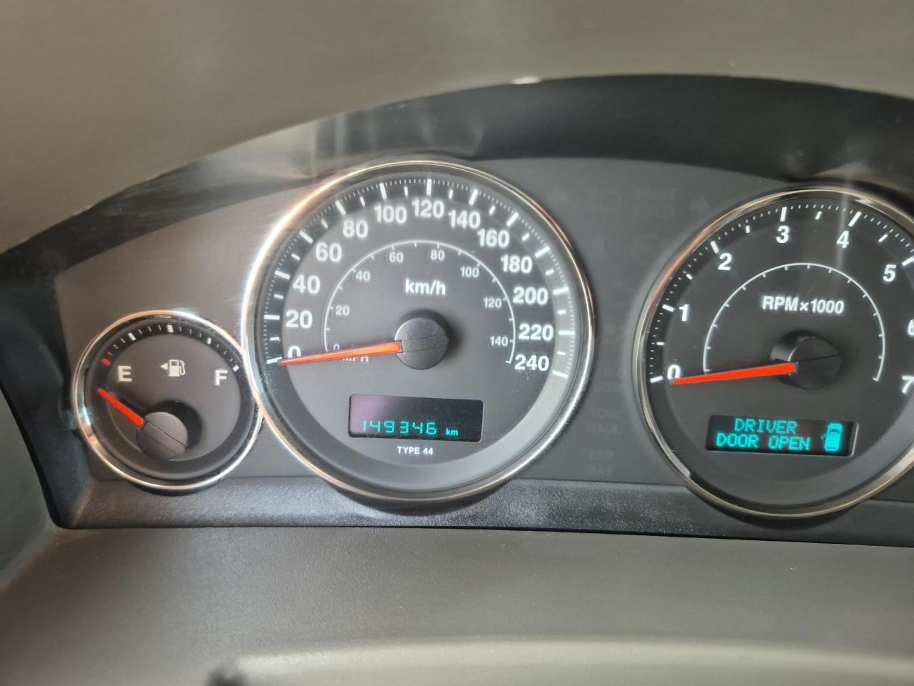12744267
