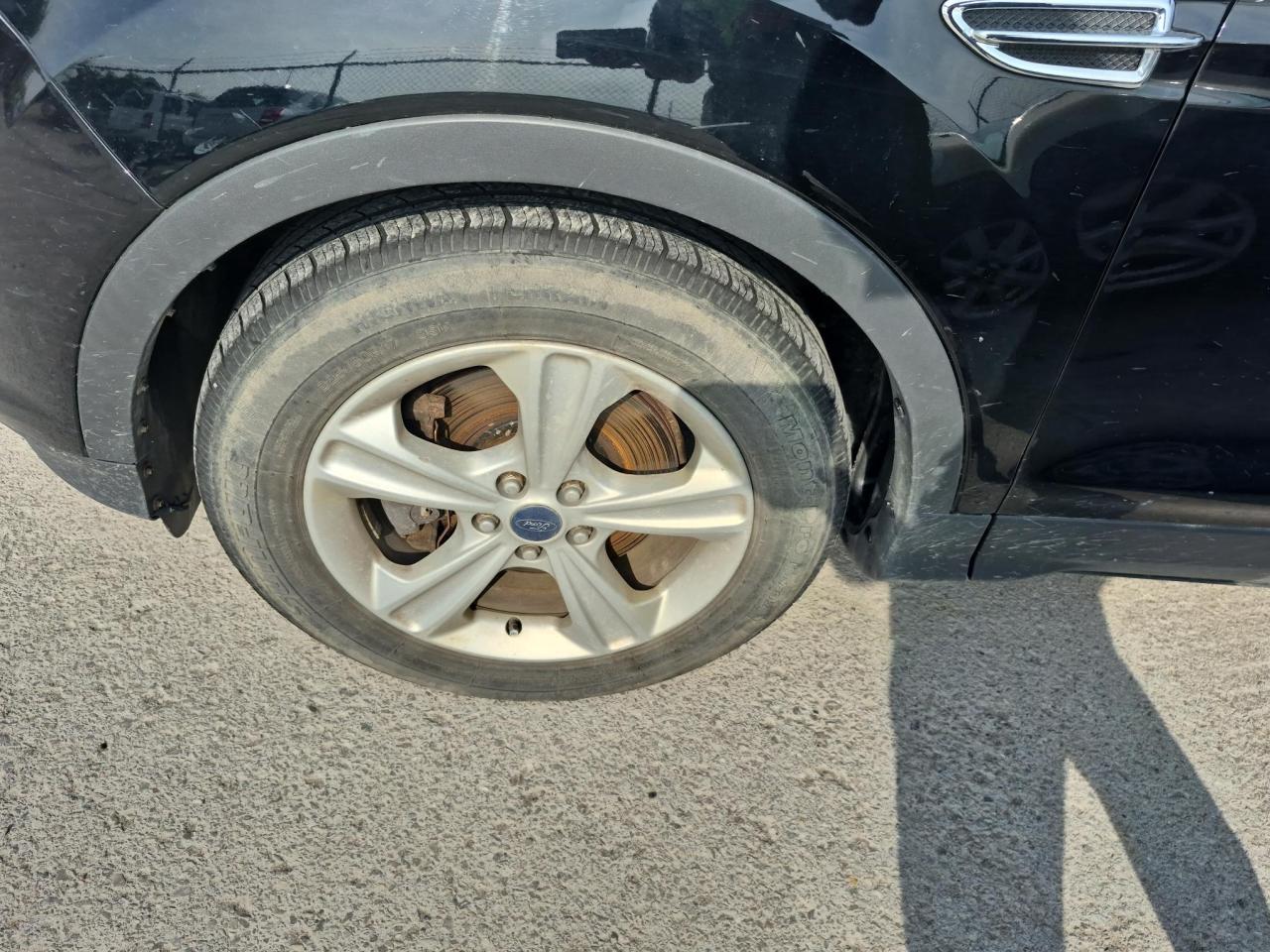 12744273